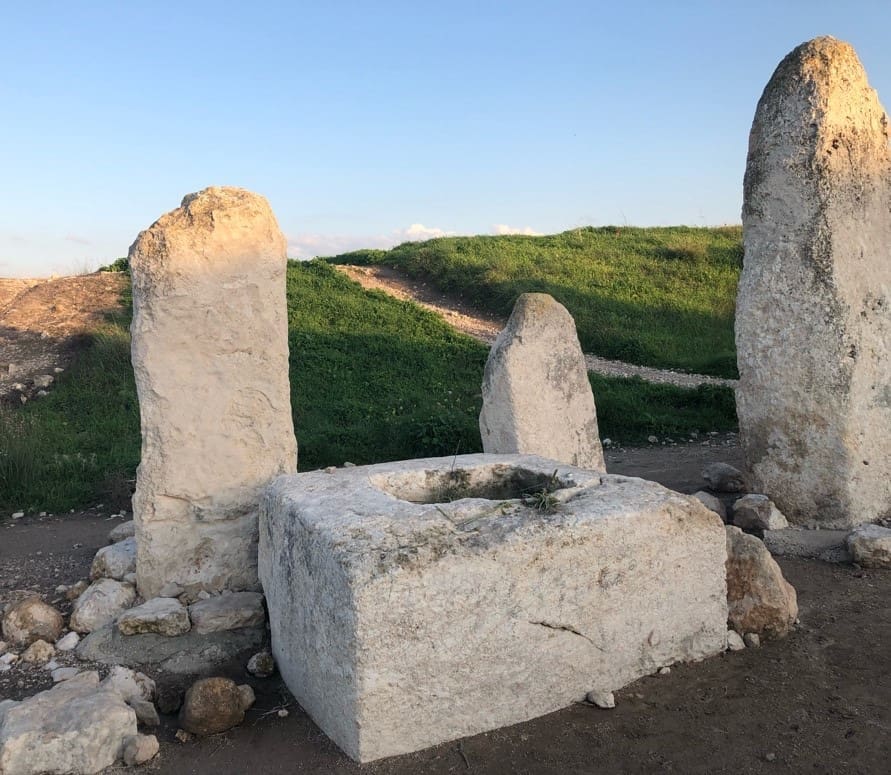 Canaanite pillars have been found throughout the holy land, but the ones at Gezer are unique due to their Size and number. The pillars, and the stone basin. The basin was probably used for the pouring of drink offerings. The stones are believed to represent specific Canaanite gods. Photo by John Buckner