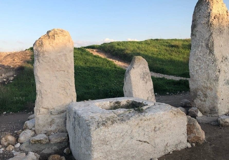 Canaanite pillars have been found throughout the holy land, but the ones at Gezer are unique due to their Size and number. The pillars, and the stone basin. The basin was probably used for the pouring of drink offerings. The stones are believed to represent specific Canaanite gods. Photo by John Buckner